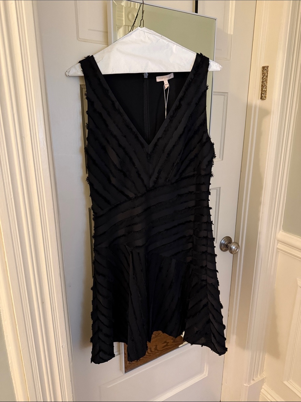 Elegant Black Textured V-Neck Sleeveless Dress